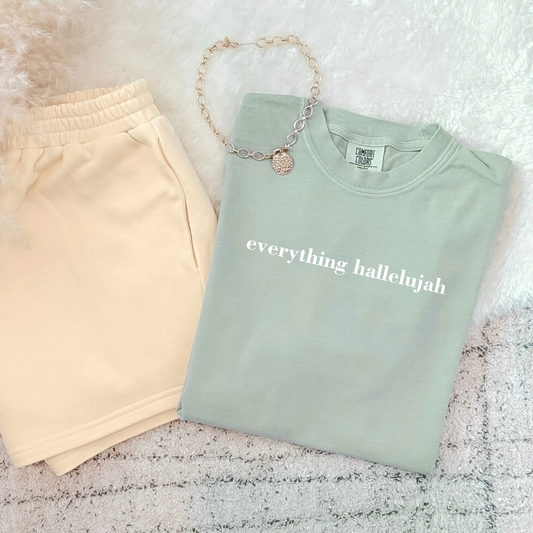 Bay green Everything Hallelujah faith inspired graphic t-shirt with minimalist white text