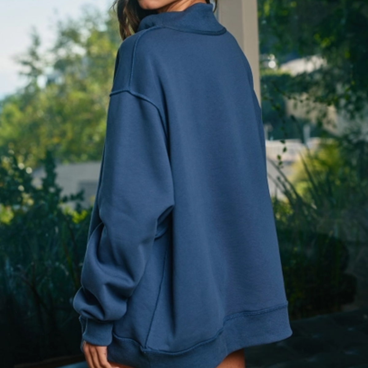 Navy reversible Senior Mom 2027 mock neck sweatshirt shown from the back with relaxed oversized fit and solid navy fabric.