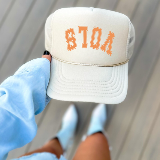 Neutral foam front trucker hat with upside down VOLS lettering sports trend