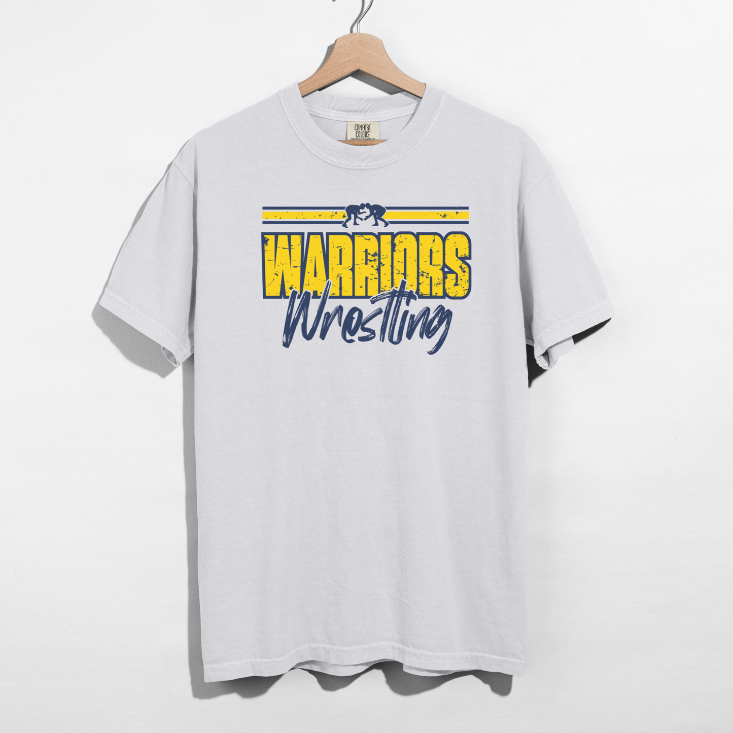 White t-shirt with 'Warriors Wrestling' text and logo on a hanger against a white background