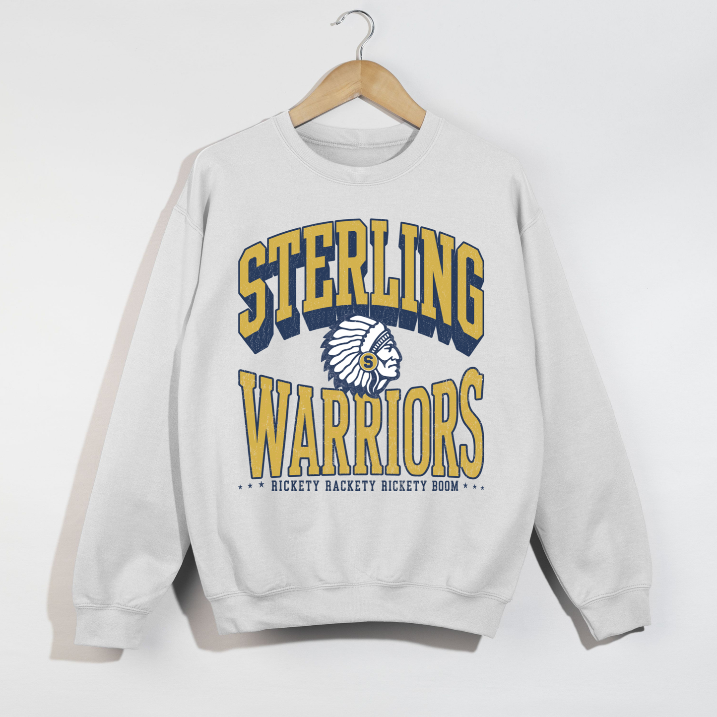 White Sterling Warriors vintage school spirit sweatshirt with oversized collegiate lettering, Warrior mascot, and Rickety Rackety Rickety Boom graphic.