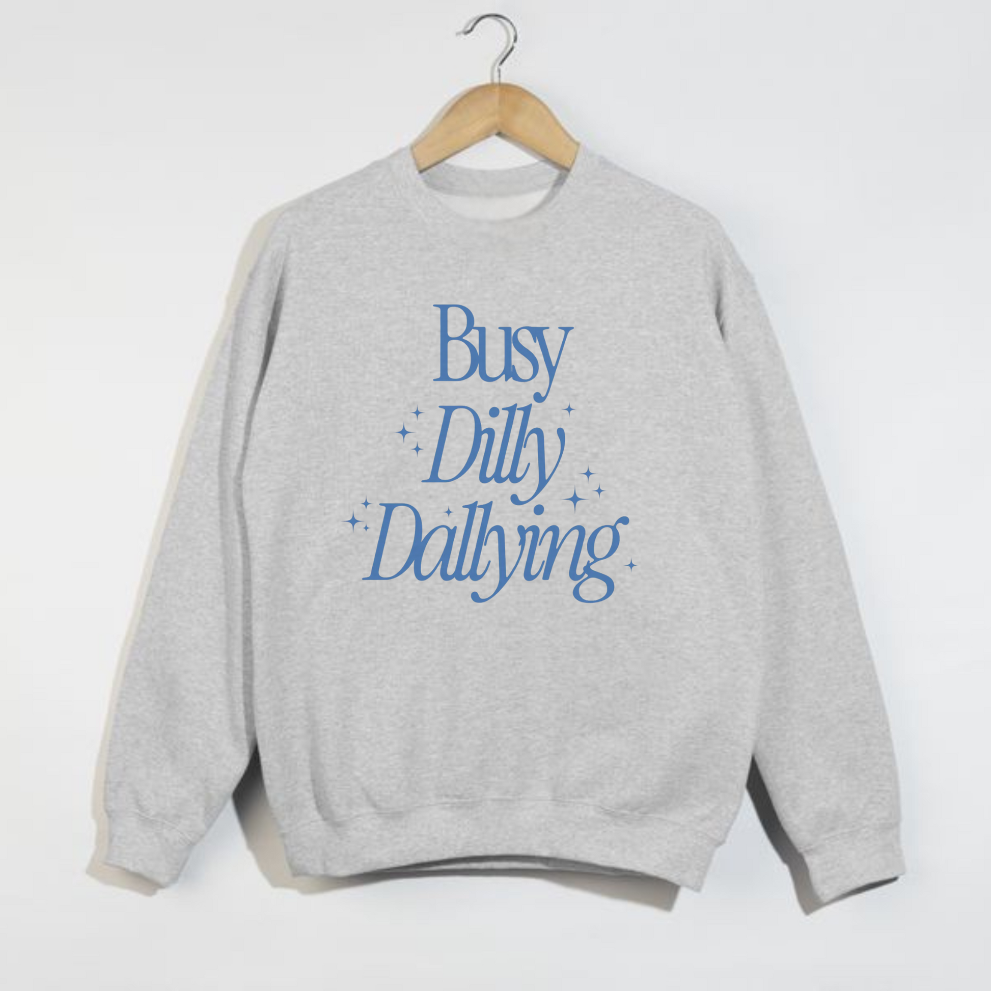 Gray sweatshirt with blue text 'Busy Dilly Dallying' on a white background