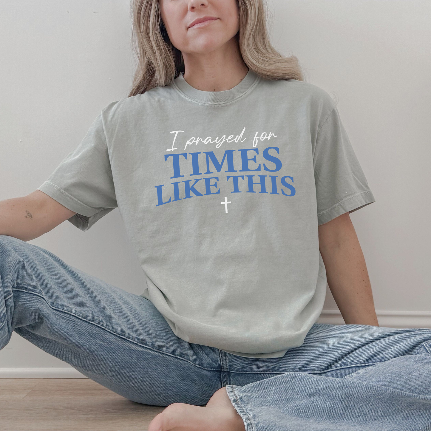 Lifestyle photo of inspirational faith shirt paired with denim