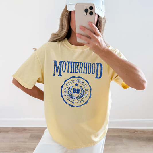 woman wearing motherhood graphic tee vintage mom shirt yellow casual outfit