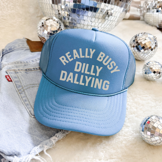 Really Busy Dilly Dallying foam trucker hat styled with denim and disco ball decor