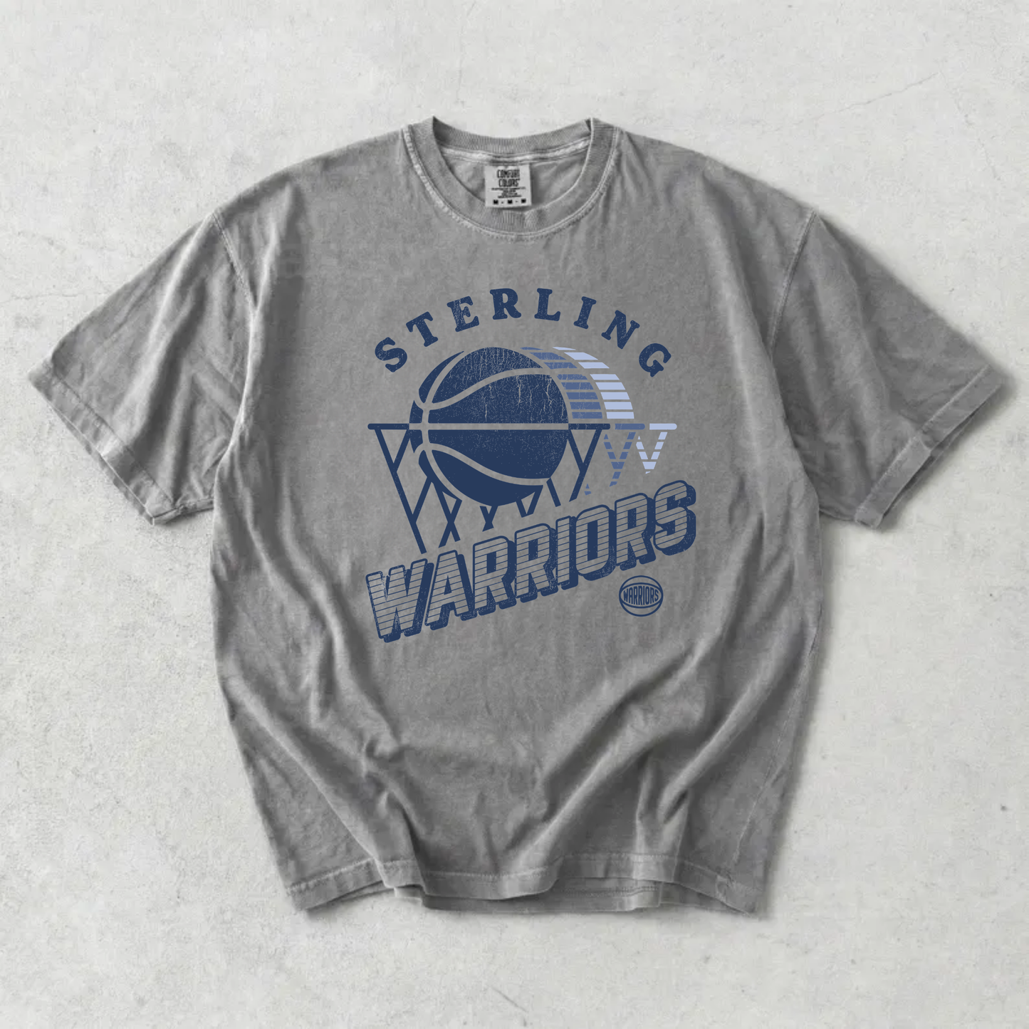 Grey Comfort Colors Sterling Warriors retro basketball graphic t-shirt with distressed vintage navy design.
