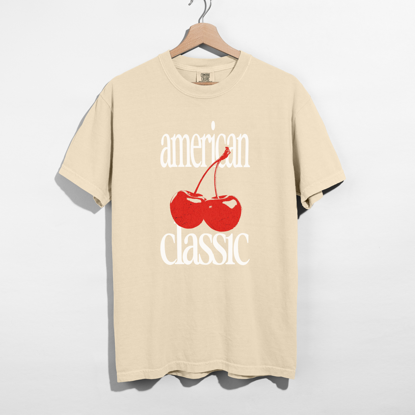 Ivory Comfort Colors T-shirt with vintage red cherry design and bold white lettering
