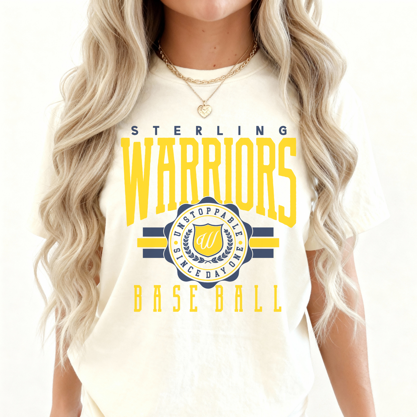 Person wearing a white t-shirt with 'Sterling Warriors Baseball' text and logo.
