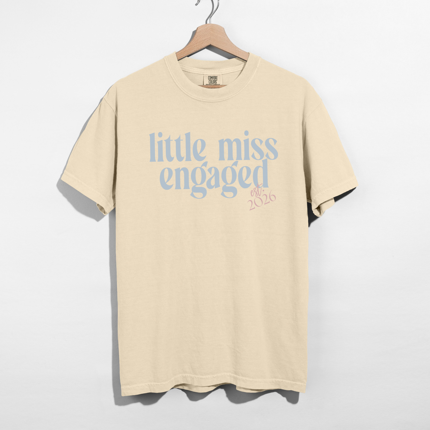 Close-up of Little Miss Engaged Est. 2026 text on bridal t-shirt