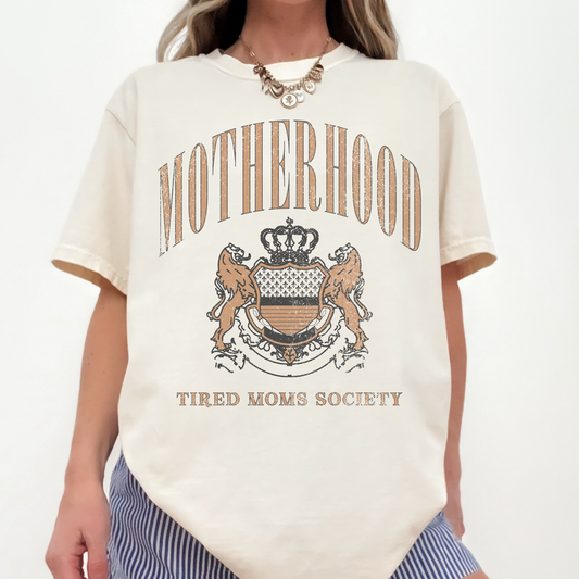 woman wearing motherhood tired moms society shirt casual everyday outfit