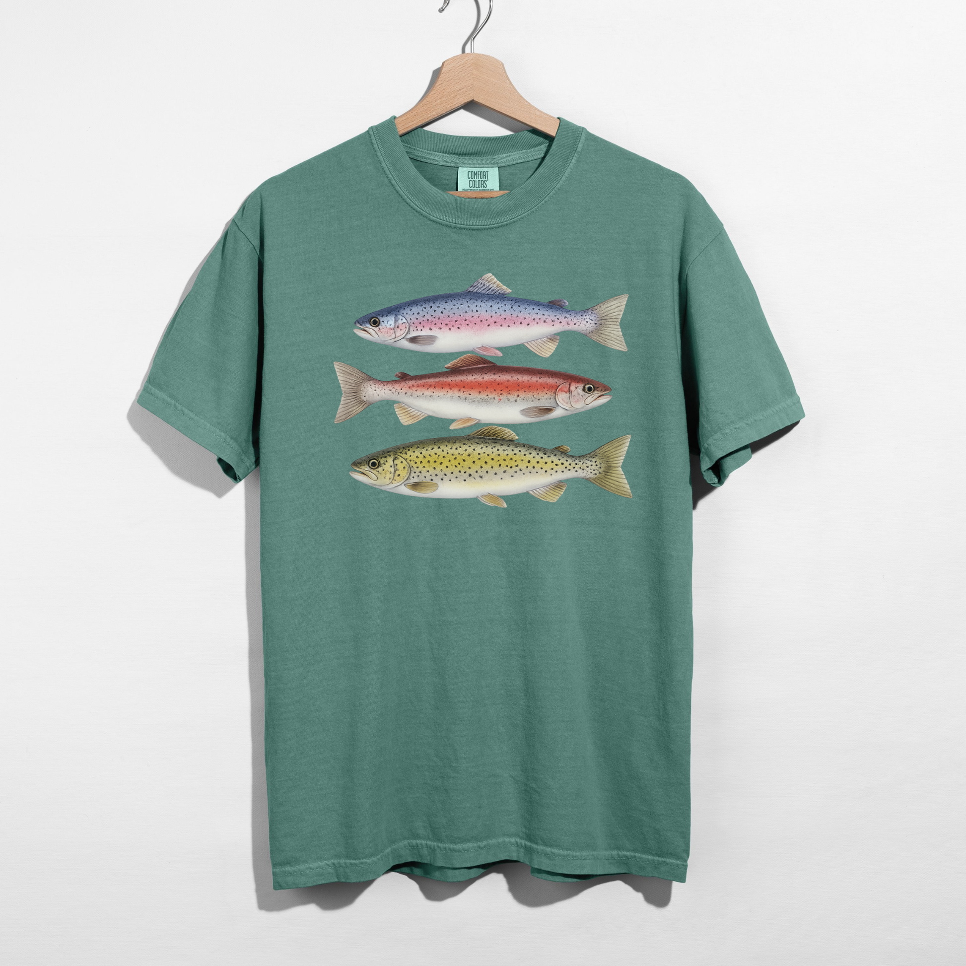 Light green outdoor graphic tee featuring three detailed trout fish illustrations