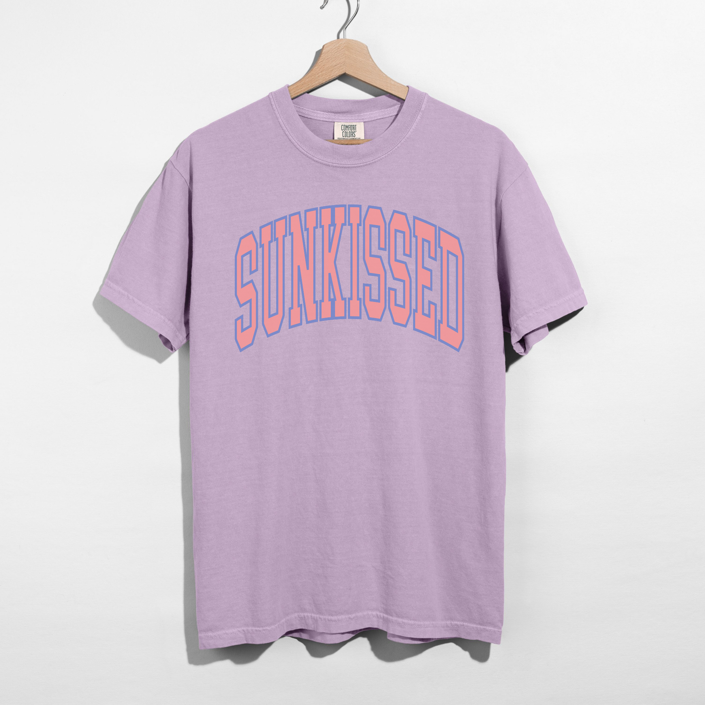 Lavender SUNKISSED graphic t-shirt with pastel collegiate font, trendy summer graphic tee