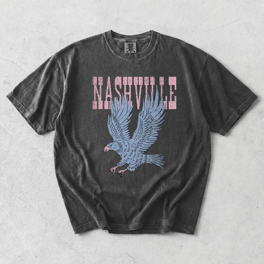 Pepper Comfort Colors Nashville eagle graphic tee with distressed vintage lettering and oversized eagle artwork.