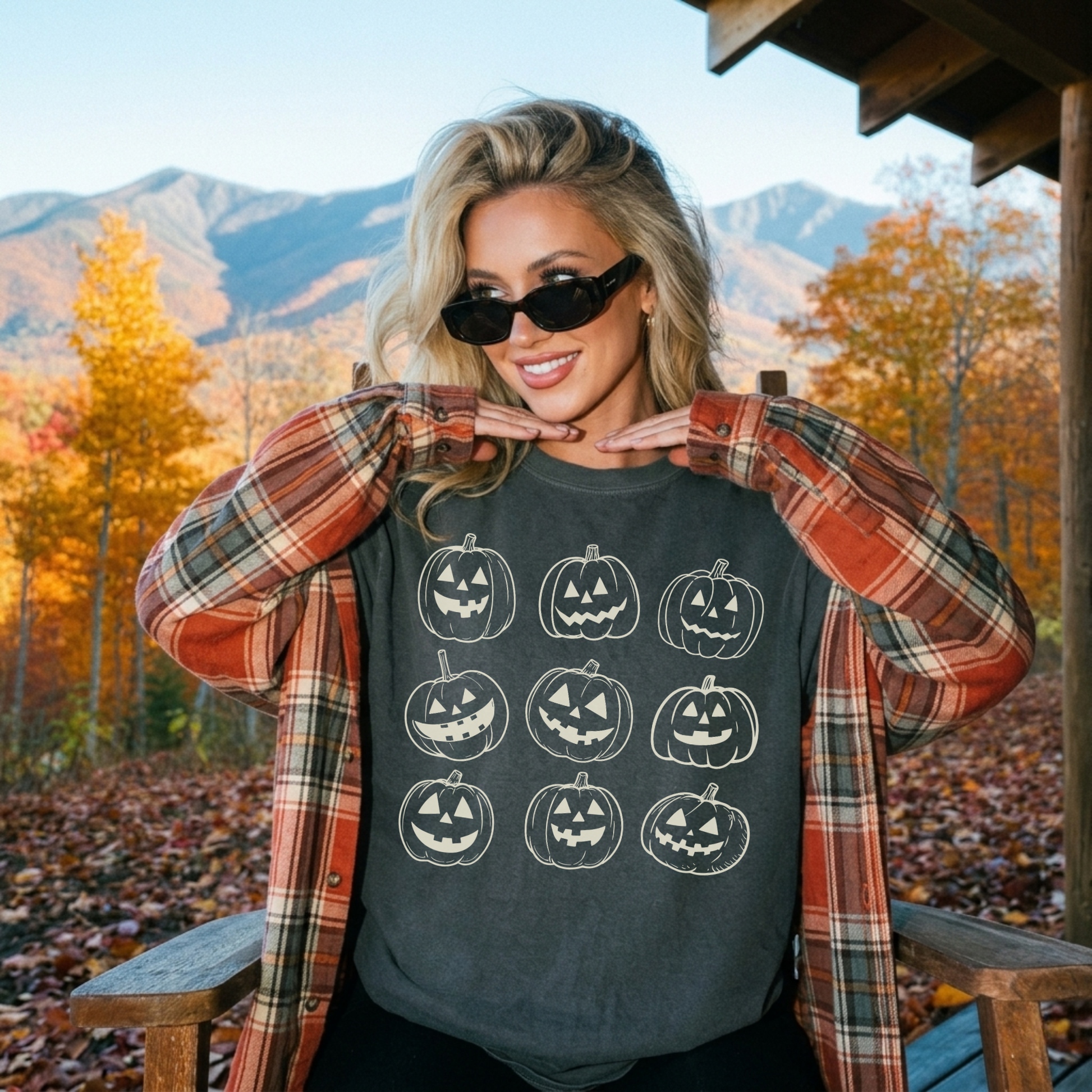 Pepper Comfort Colors Halloween pumpkin shirt featuring nine vintage jack o lantern pumpkins styled with a fall flannel outdoors.