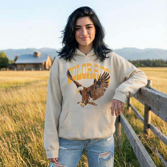 woman wearing sand colorado eagle hoodie western outfit casual fall style denim jeans