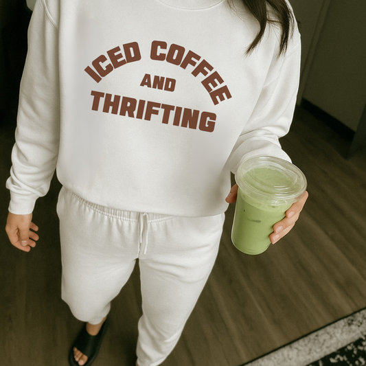 White iced coffee and thrifting sweatshirt worn with matching lounge set and iced drink