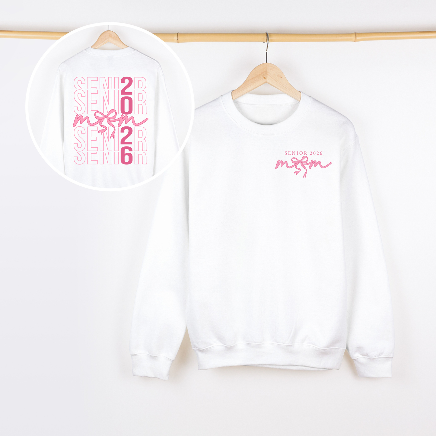 Two white sweatshirts with pink text on a white background