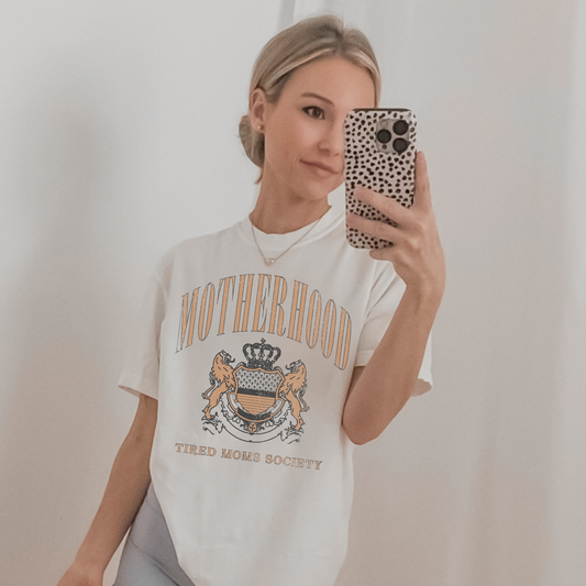 white motherhood graphic tee tired moms society outfit mom style