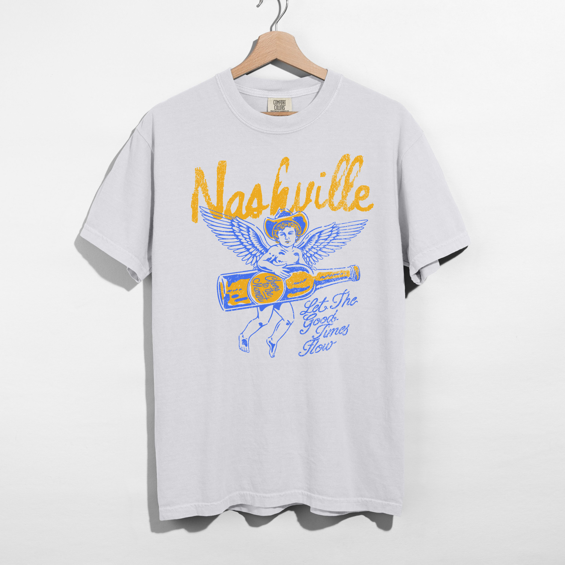 White t-shirt with 'Nashville' graphic design on a hanger against a white background