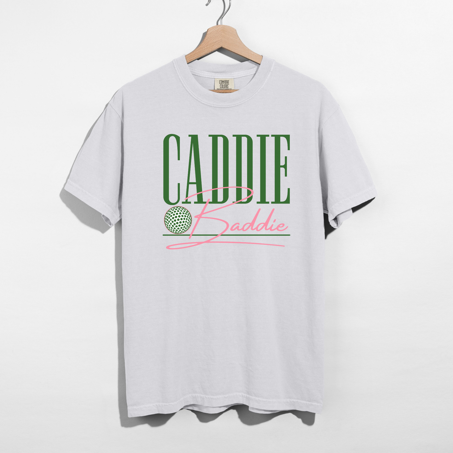 White Caddie Baddie graphic tee with green and pink design cute golf shirt aesthetic