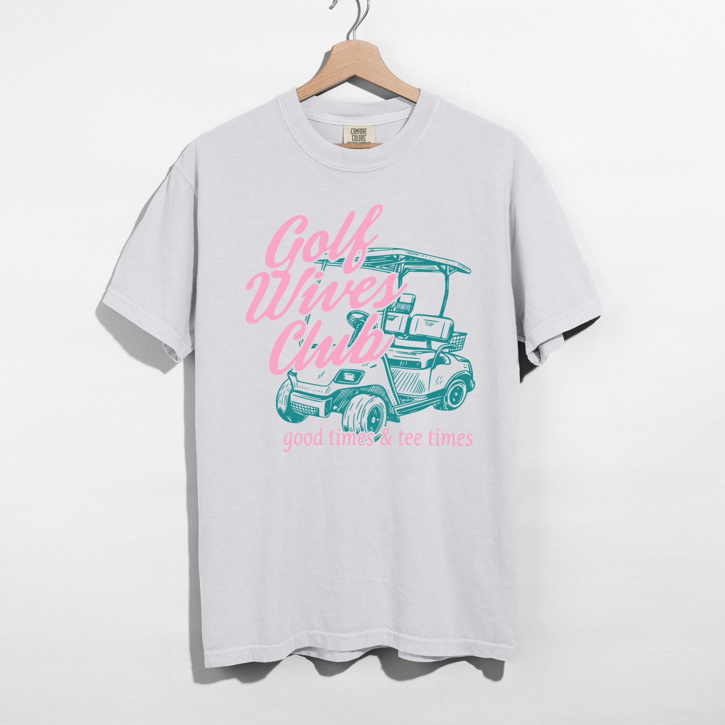 White Golf Wives Club graphic tee with pink and green design golf shirt aesthetic