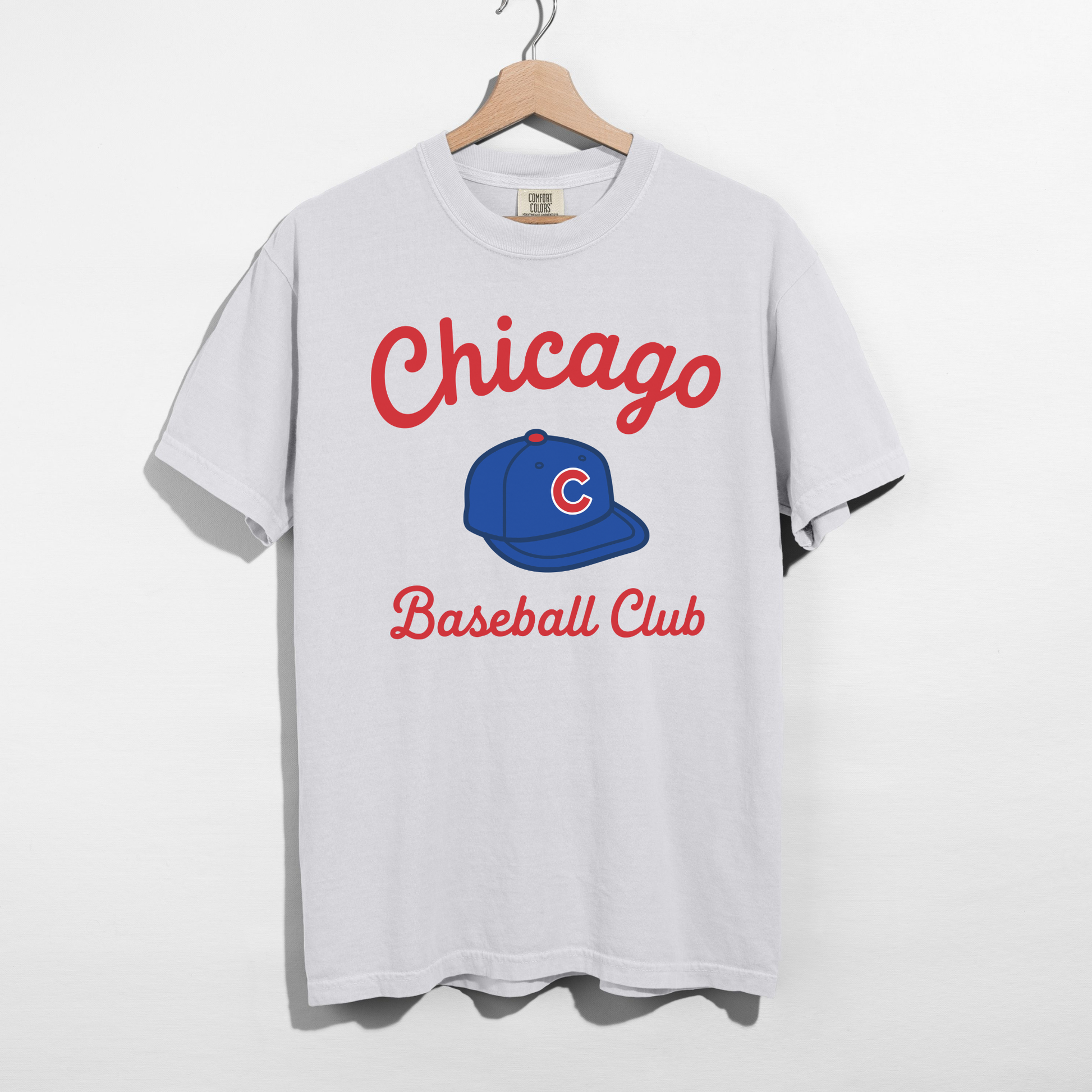 White Comfort Colors Chicago Baseball Club t-shirt with vintage sporty typography and baseball cap graphic
